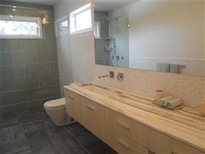 New toilet, sink and counter in bathroom remodeling project